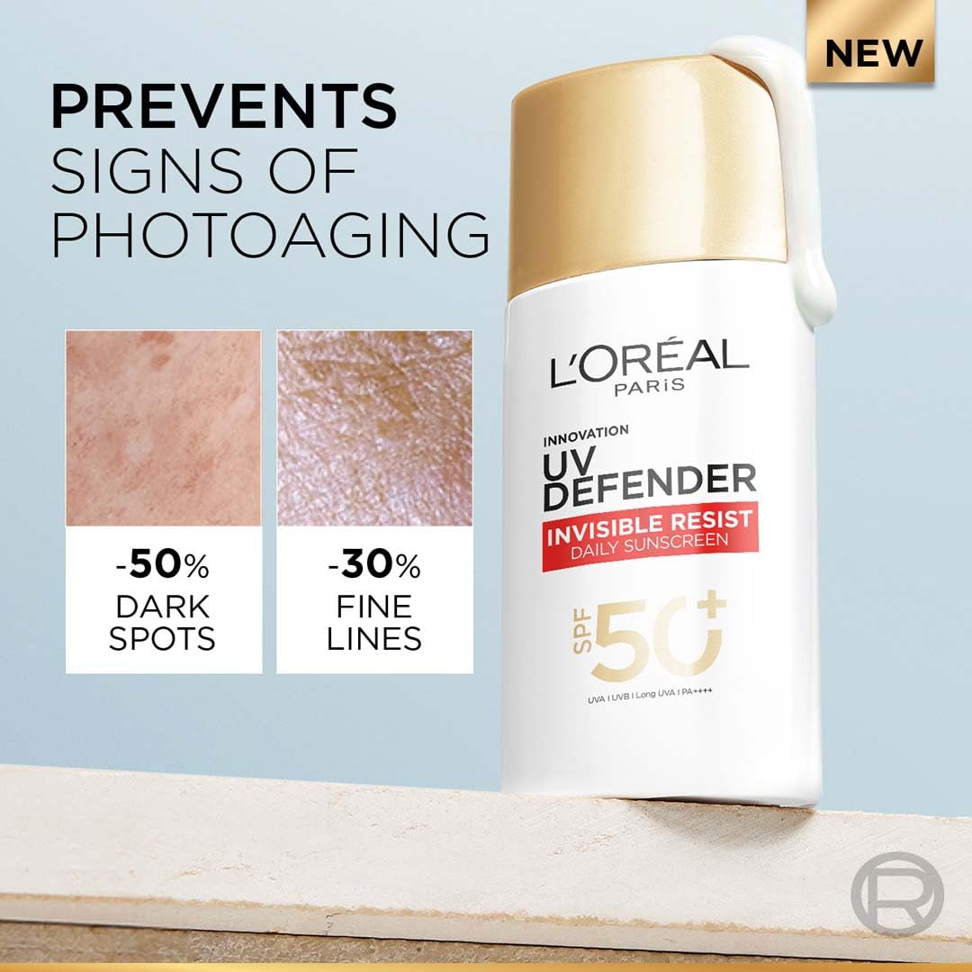 L'Oreal Paris UV Defender sunscreen bottle with anti-aging benefits on a light blue background