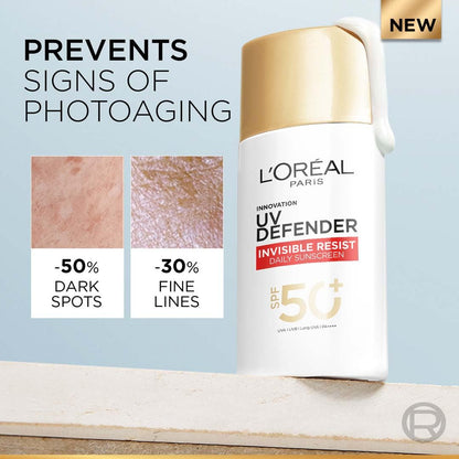 L'Oreal Paris UV Defender sunscreen bottle with anti-aging benefits on a light blue background