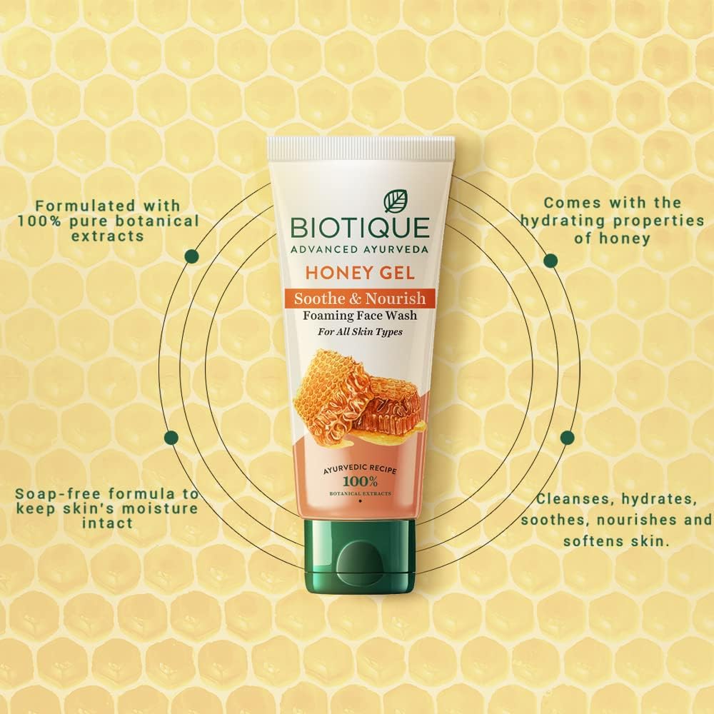 Biotique Honey Gel Foaming Face Wash tube on a honeycomb pattern background