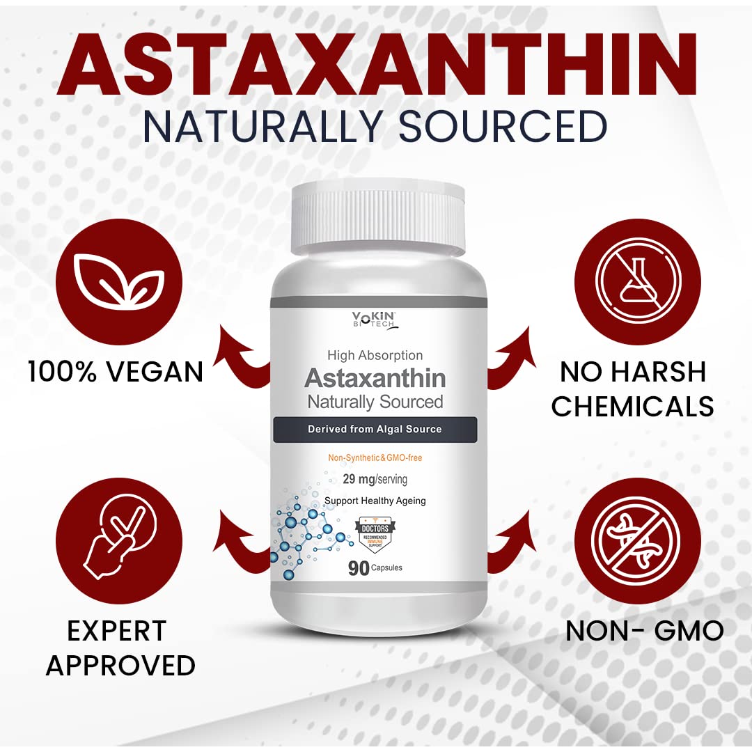 Bottle of astaxanthin supplement with certification icons on a gray background