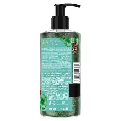 Bottle of Lux shampoo with a pump on a white background