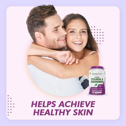 Couple embracing with a bottle of Healthy Helper Vitamin A supplement on a light purple background