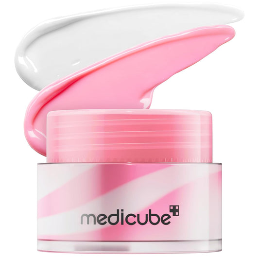 Pink and white cream jar with 'medicube' branding on a white background