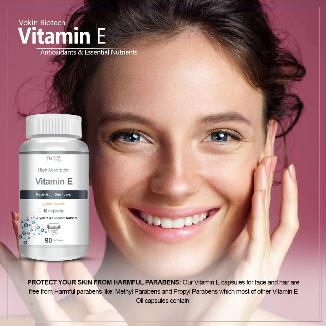 Woman with a bottle of Vakin Biotech Vitamin E capsules on a pink background