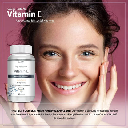 Woman with a bottle of Vakin Biotech Vitamin E capsules on a pink background