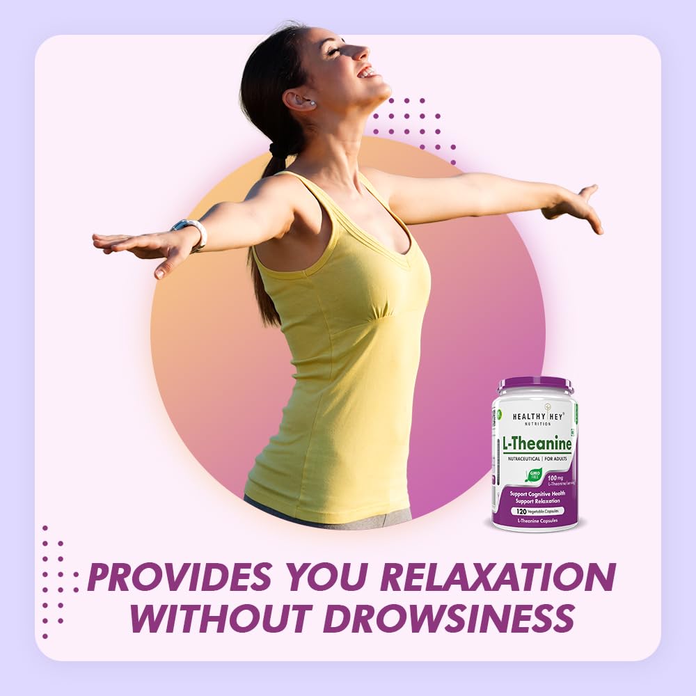 Woman in a yellow tank top with a bottle of L-Theanine supplement on a gradient background