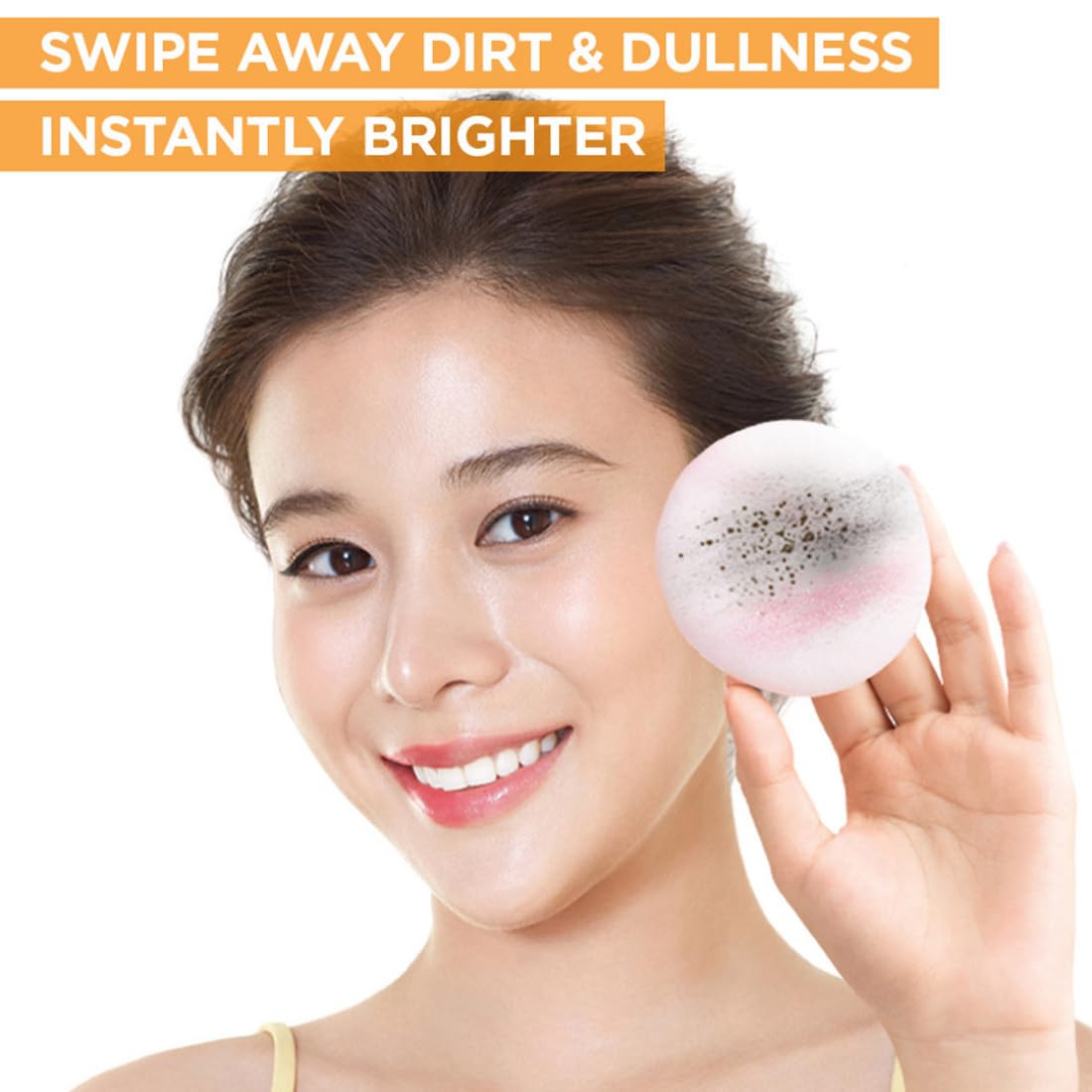 Woman holding a pink makeup sponge with text 'Swipe Away Dirt & Dullness Instantly Brighter' on a white background