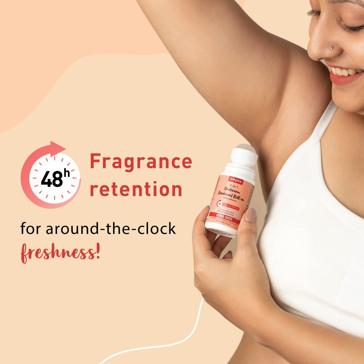 Woman holding a deodorant stick with fragrance retention text on a beige background