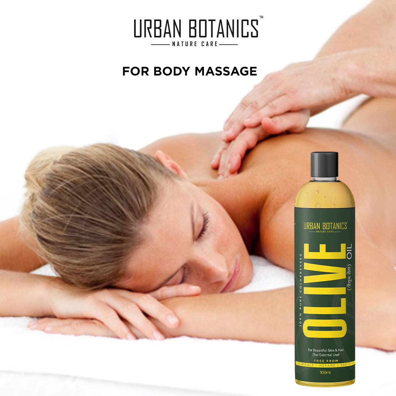 Person receiving a massage with Urban Botanics olive oil bottle displayed.