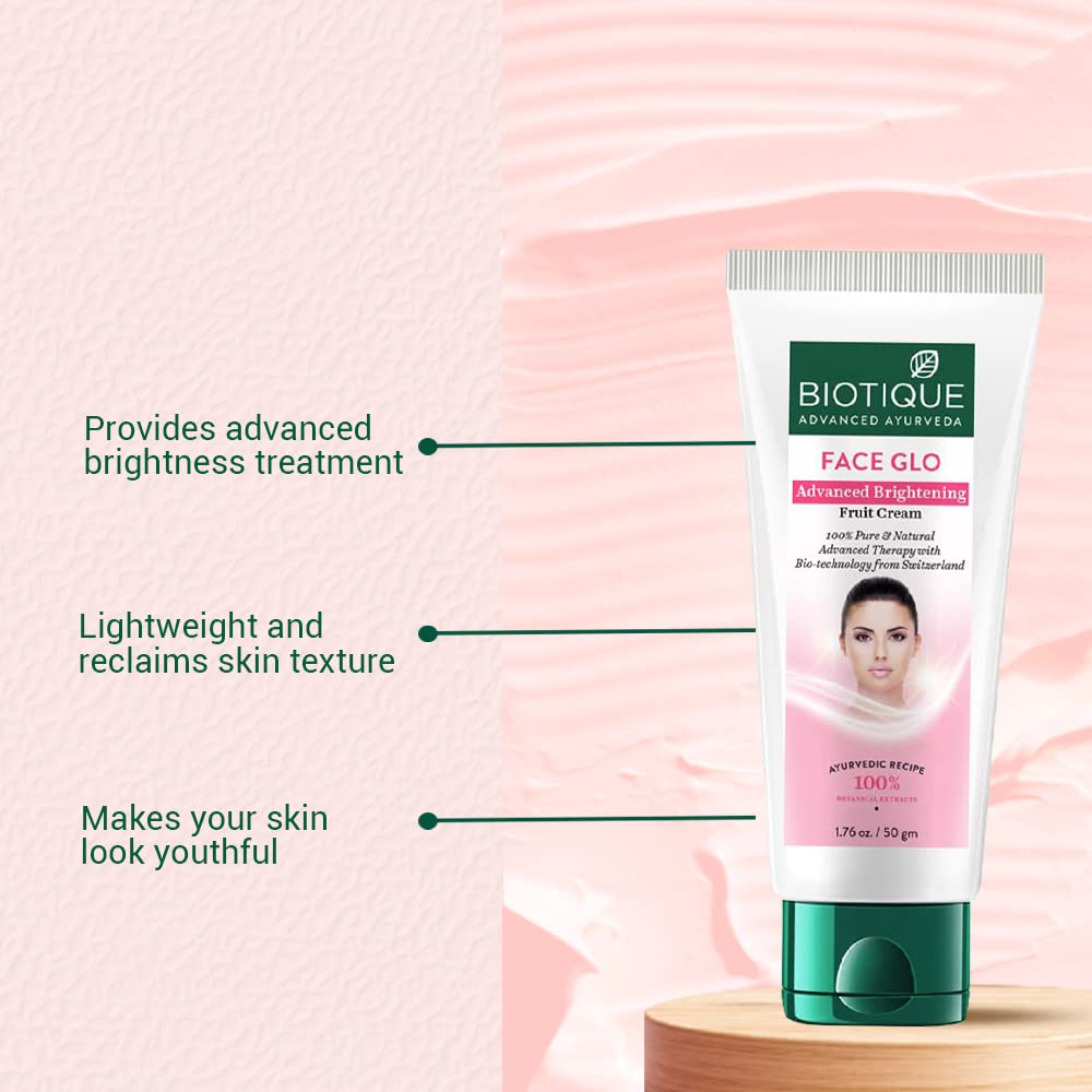 Biotique Face Glo cream tube with text on a pink background