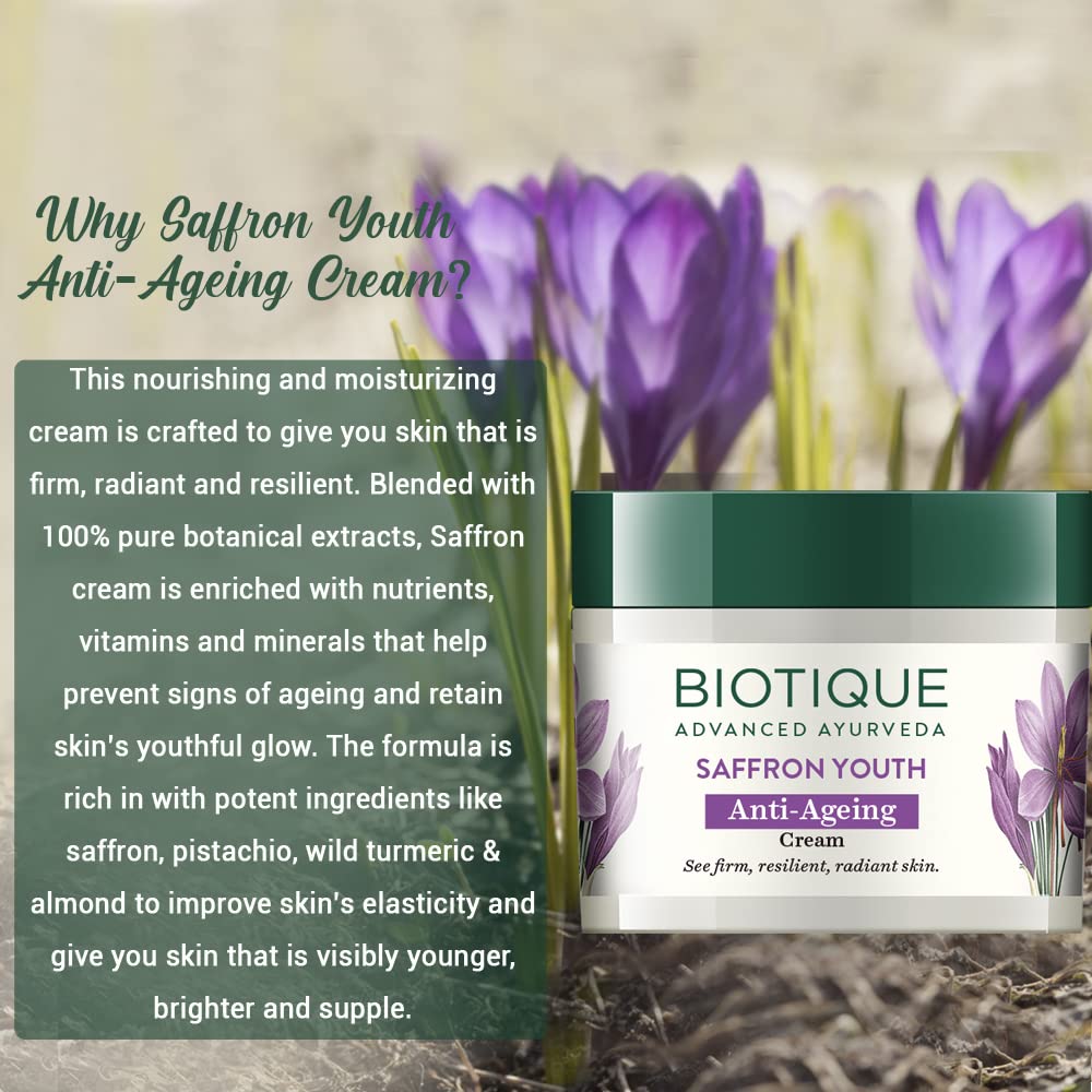 Biotique Saffron Youth Anti-Ageing Cream with saffron flowers in the background