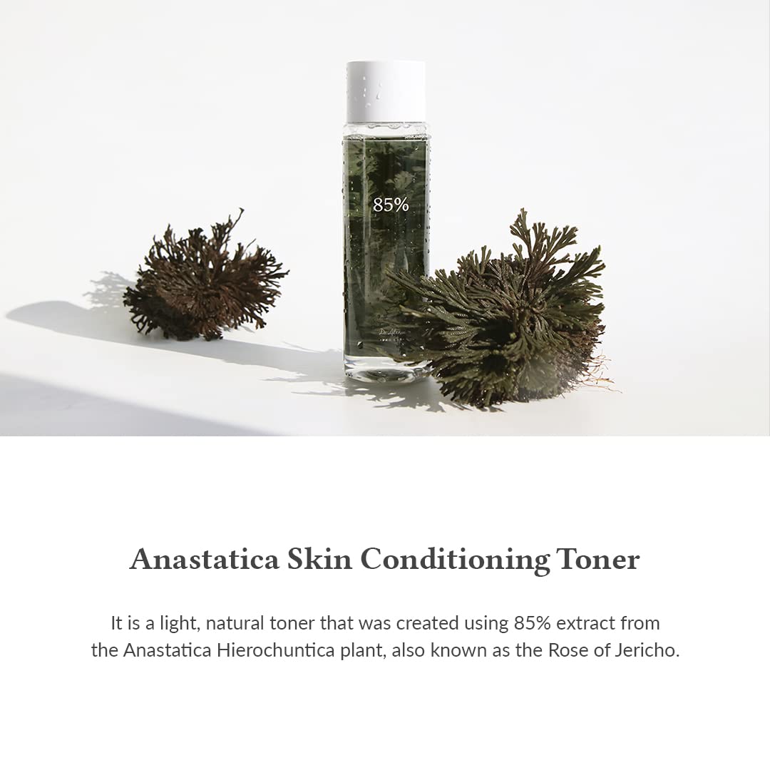 Anastatica Skin Conditioning Toner with plant material on a white background