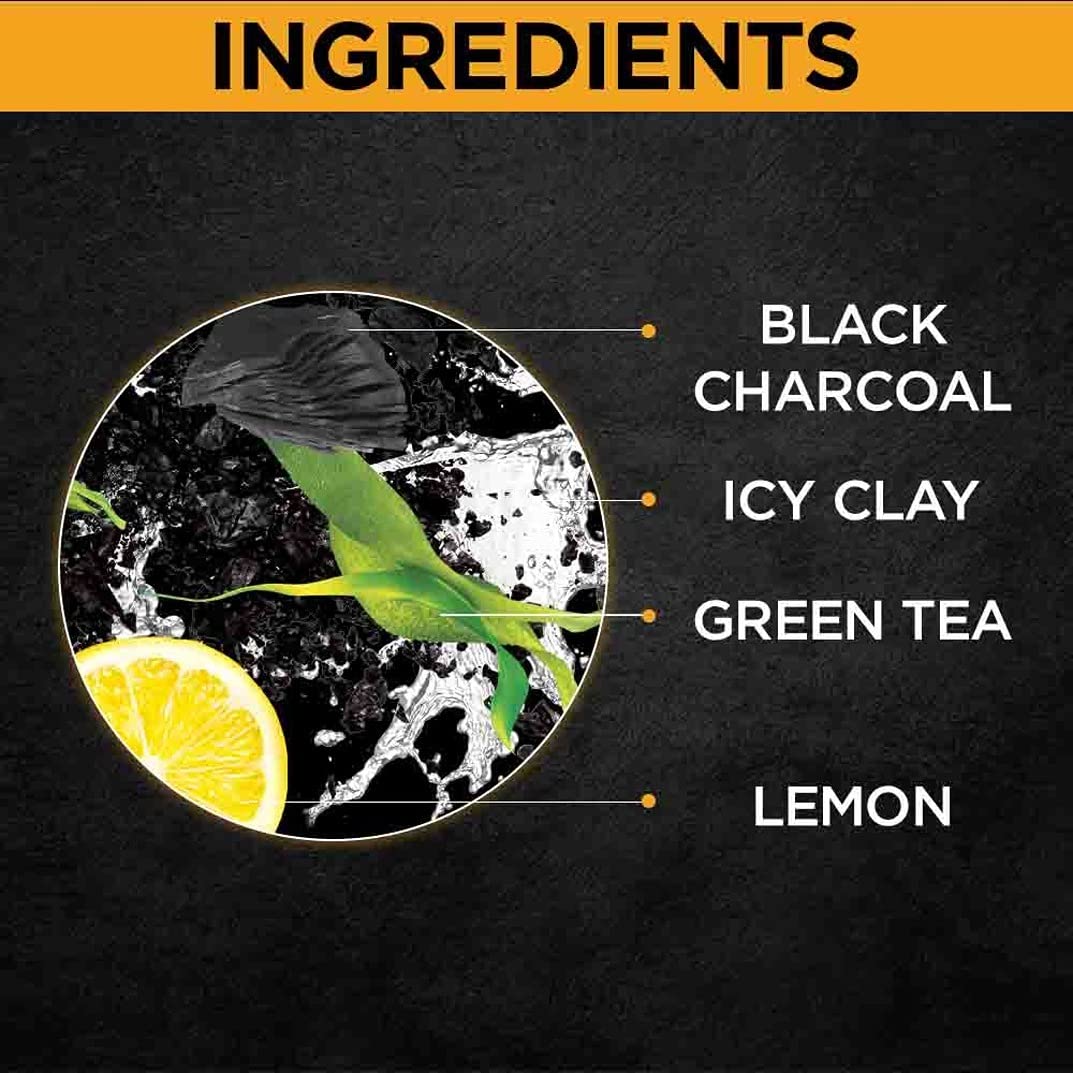 Ingredients of a product with black charcoal, icy clay, green tea, and lemon on a dark background.