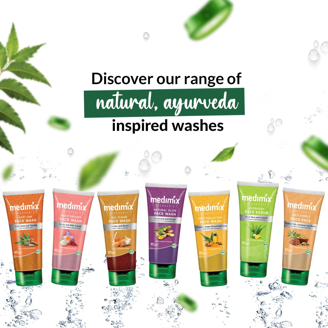 Medimix natural ayurveda inspired face wash products with green leaves and water droplets on a white background.