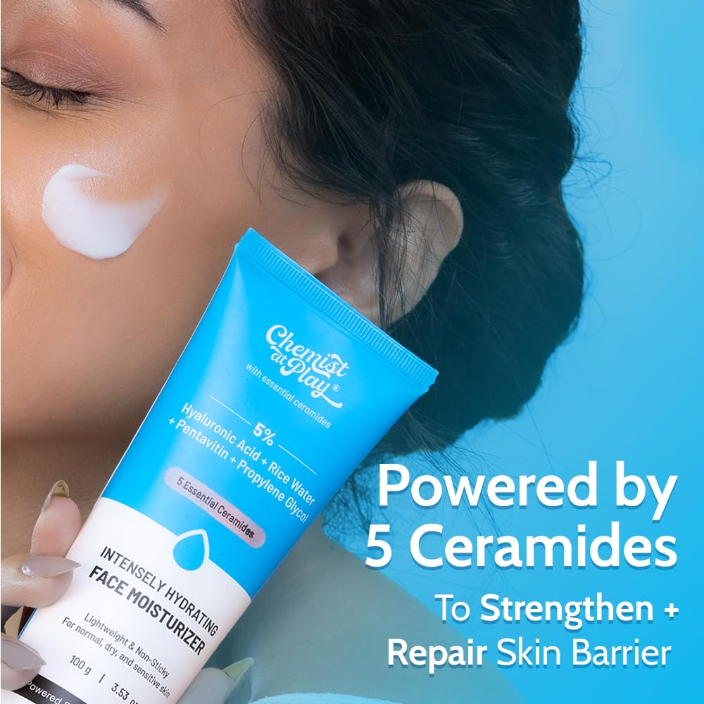 Woman applying face moisturizer with a focus on the product packaging.
