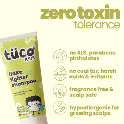 TüUÑ KIDS flake fighter shampoo tube with zero toxin tolerance text and icons on a white background