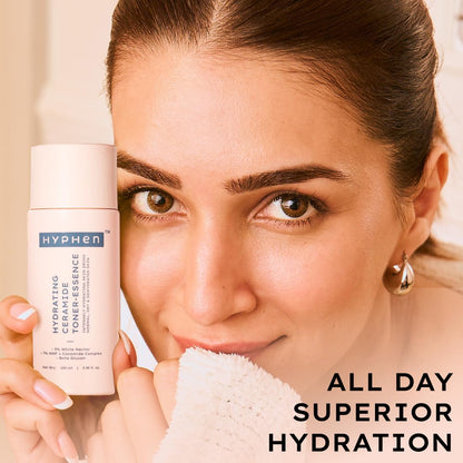 Woman holding a bottle of Hyphen skincare product with text 'All Day Superior Hydration'.