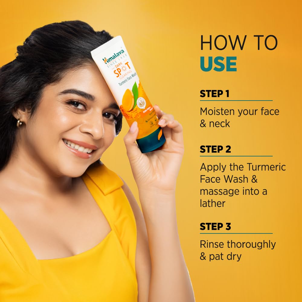 Woman holding a tube of Himalaya Turmeric Face Wash with usage instructions on a yellow background