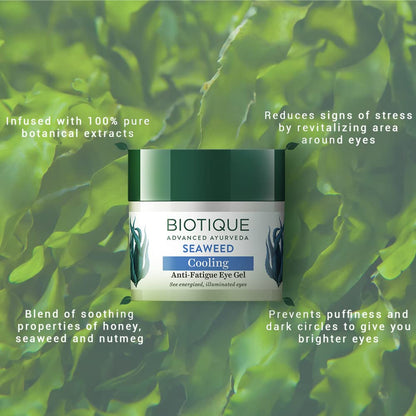 Biotique Seaweed Cooling Anti-Fatigue Eye Gel jar with green leafy background