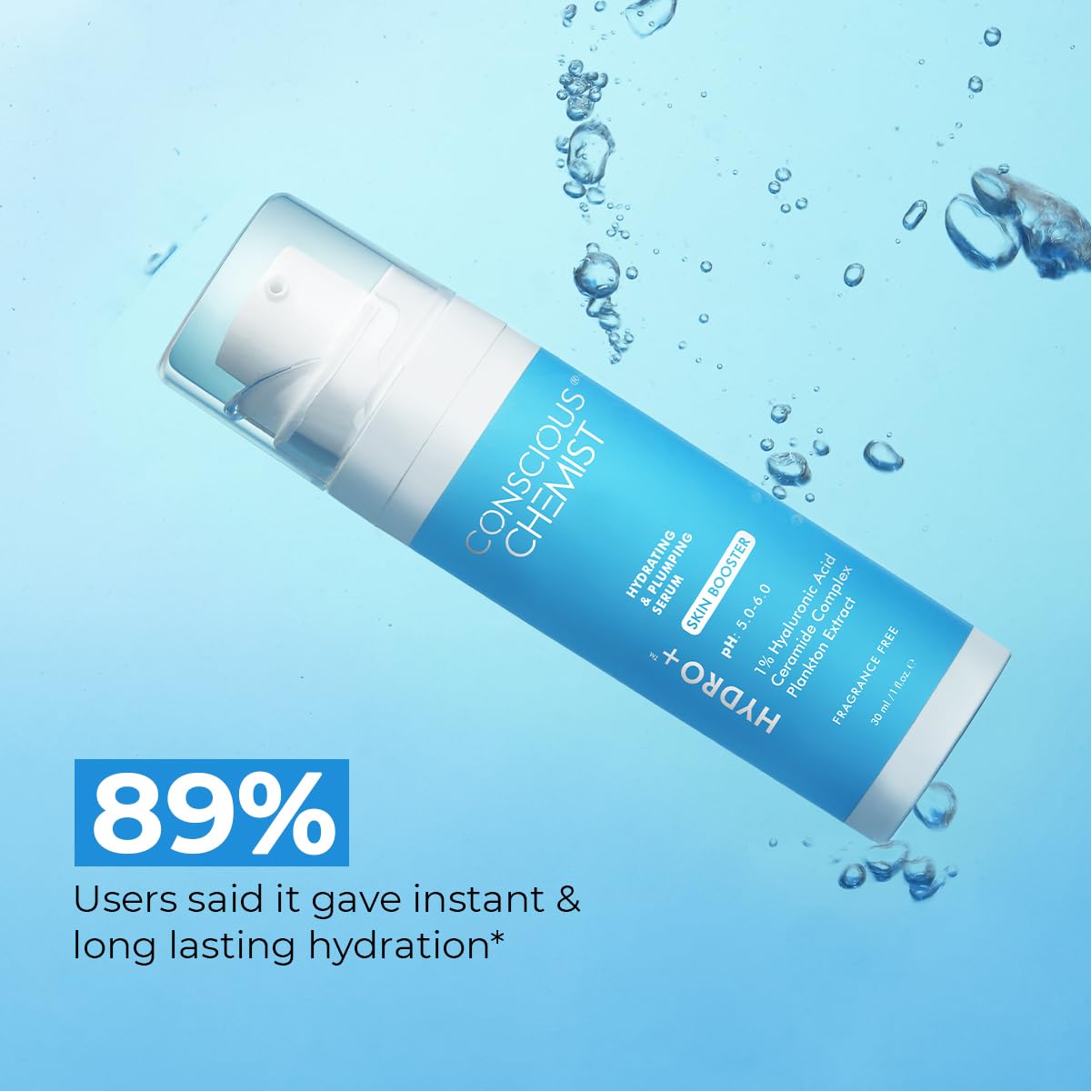Tube of conscious chemist skincare product with water droplets on a blue background