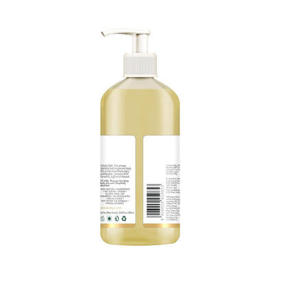 Bottle of shampoo with pump on a white background