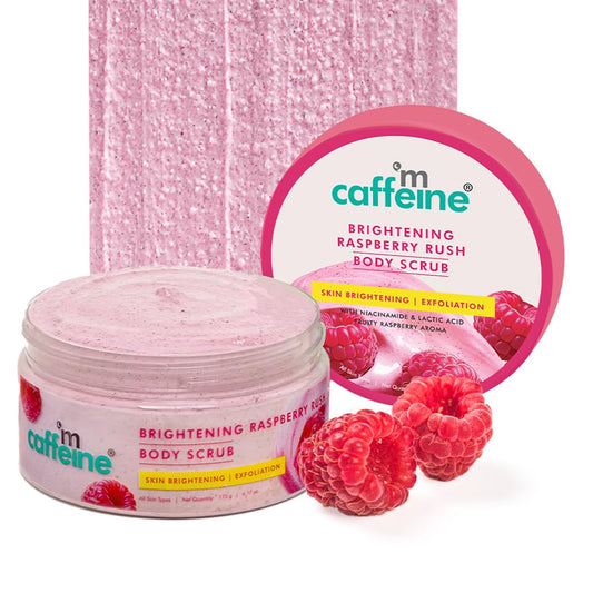 Caffeine Brightening Raspberry Rush Body Scrub with packaging and raspberries on a white background