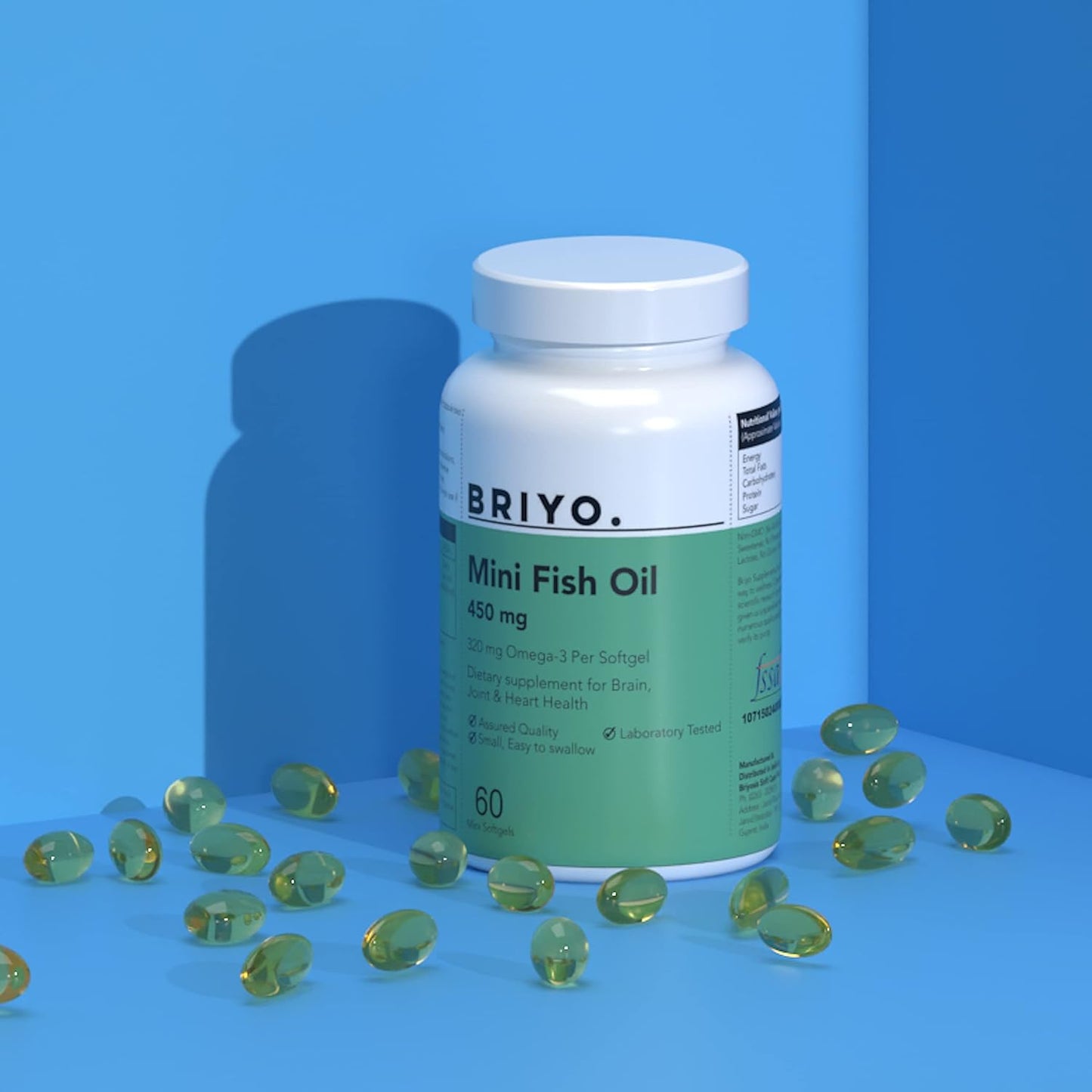 Bottle of Briyo Mini Fish Oil with scattered capsules on a blue background