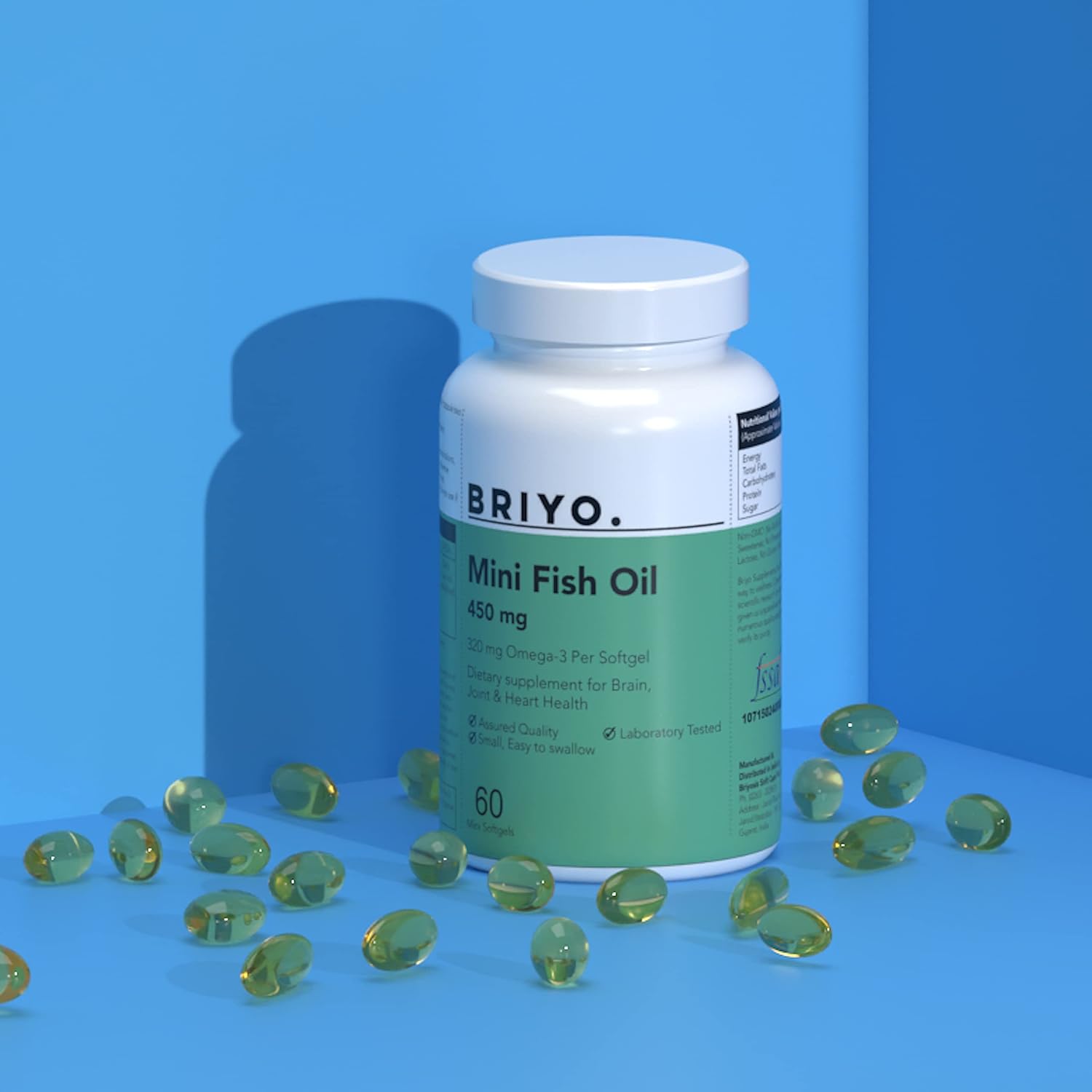 Bottle of Briyo Mini Fish Oil with scattered capsules on a blue background