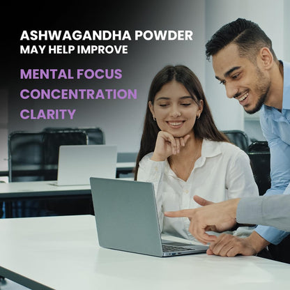 Two people looking at a laptop with text about Ashwagandha powder benefits.
