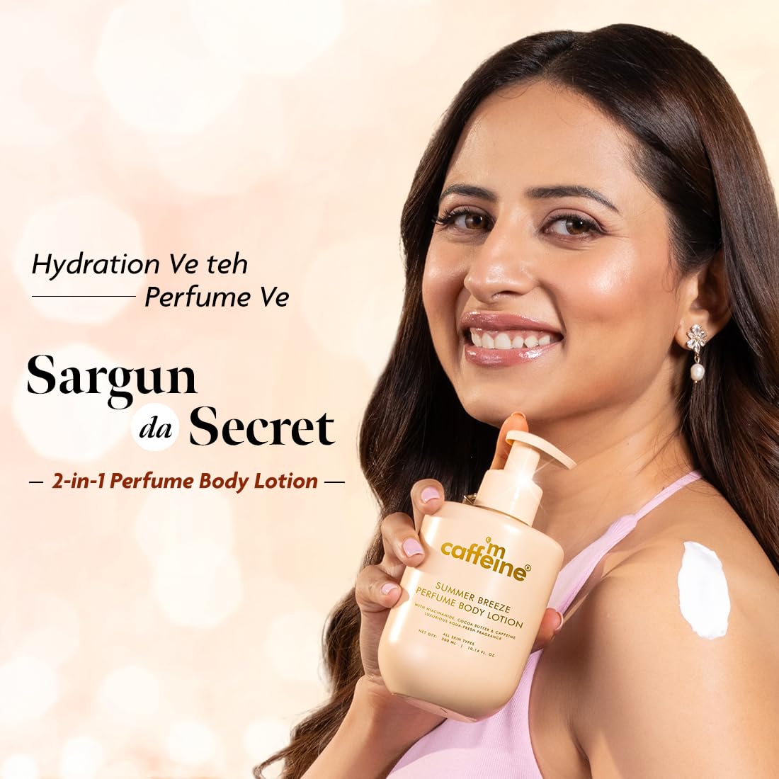 Woman holding a 2-in-1 perfume body lotion with visible branding on a beige background