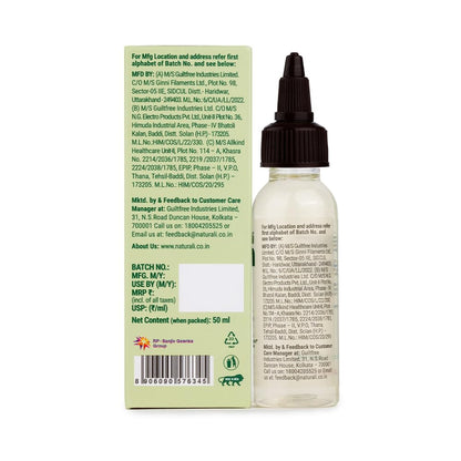 Bottle with dropper and its label on a white background