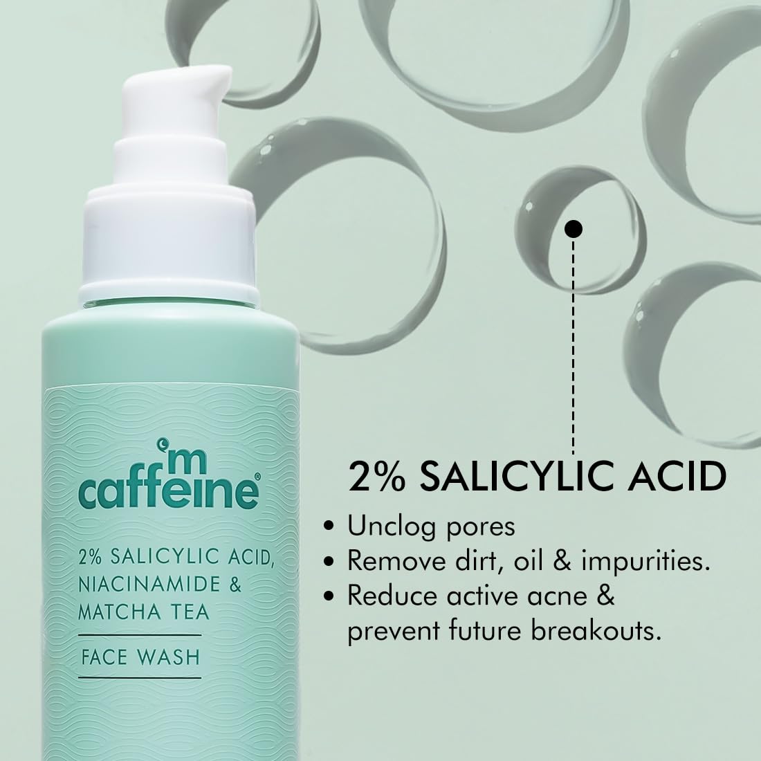 Caffeine skincare product with salicylic acid on a light green background