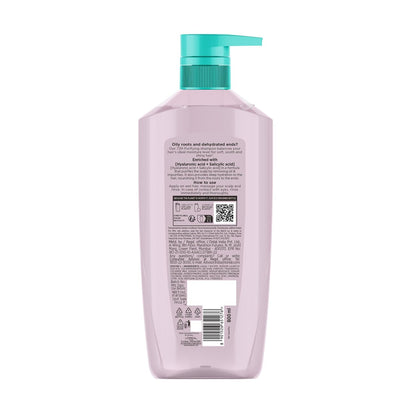 Back view of a shampoo bottle with a pump on a white background