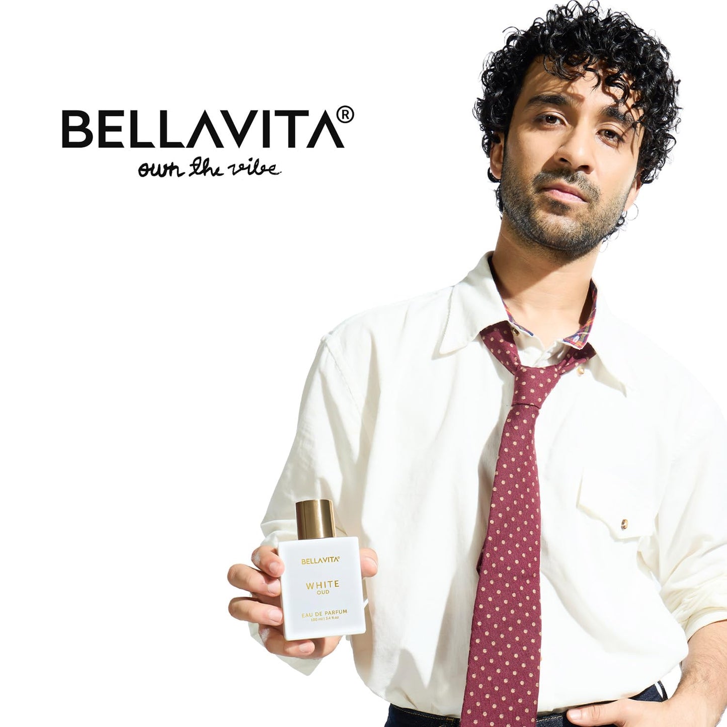 Man holding a Bellavita product with the brand name displayed.