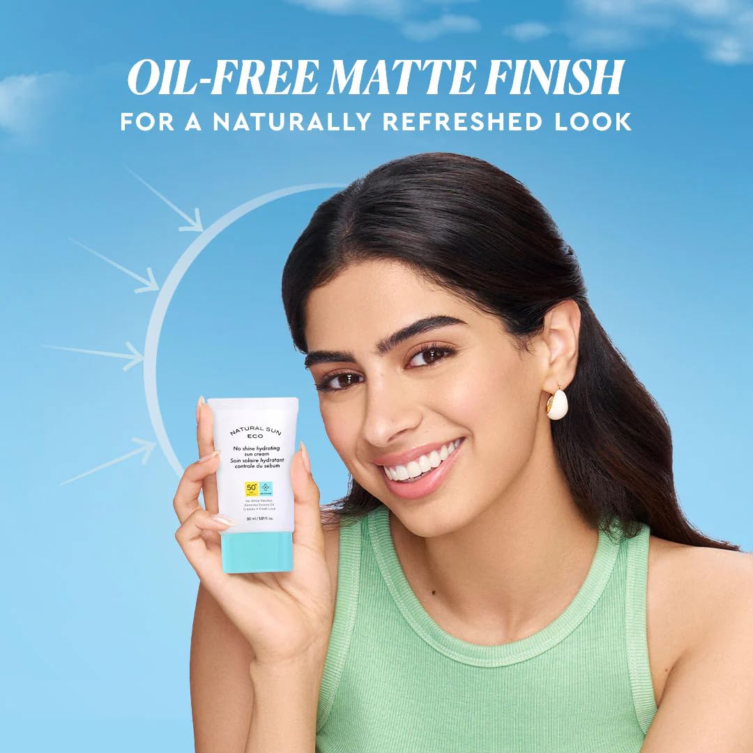 Woman holding a skincare product with text about oil-free matte finish on a blue background