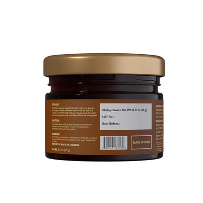 Jar with a gold lid on a white background