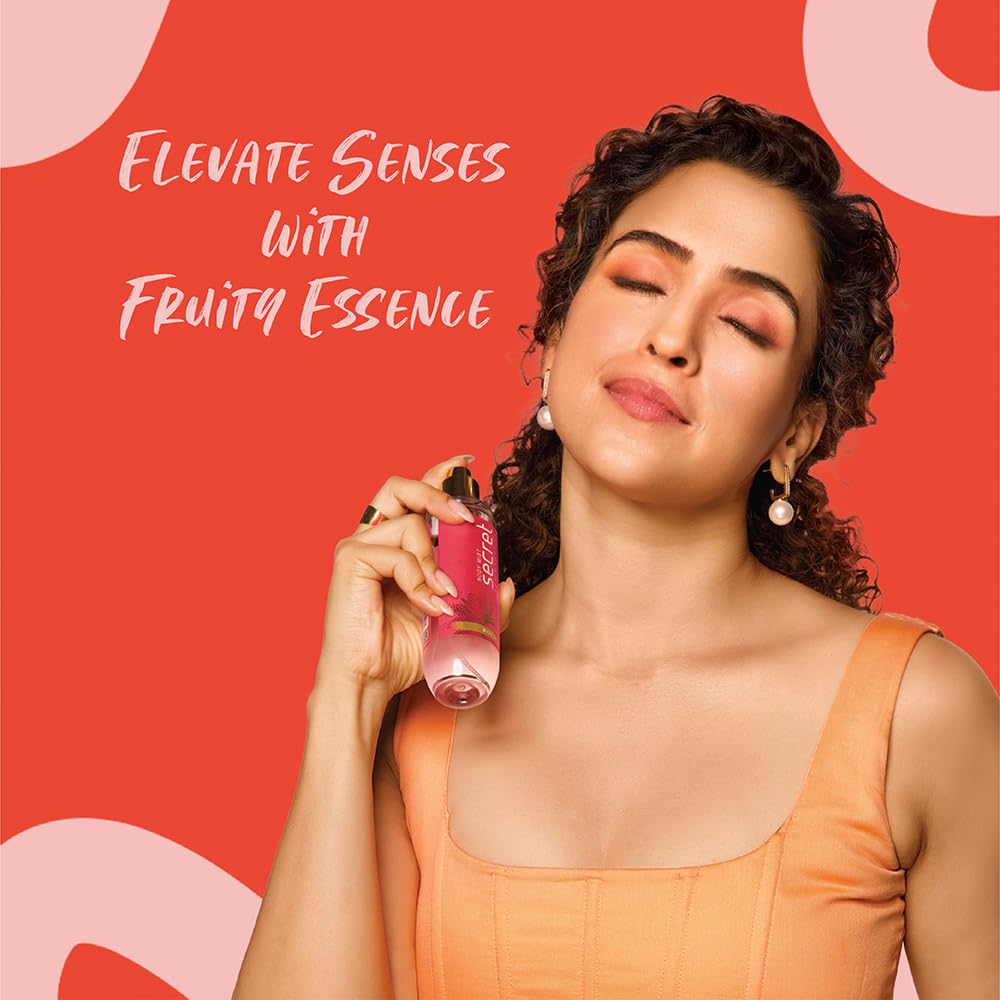 Woman holding a pink bottle with text 'Elevate Senses with Fruity Essence' on a red background