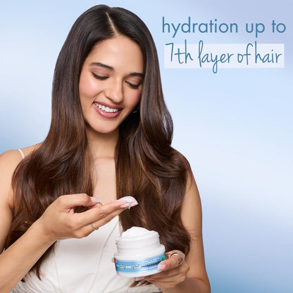 Woman holding a jar of hair care product with text about hair hydration.