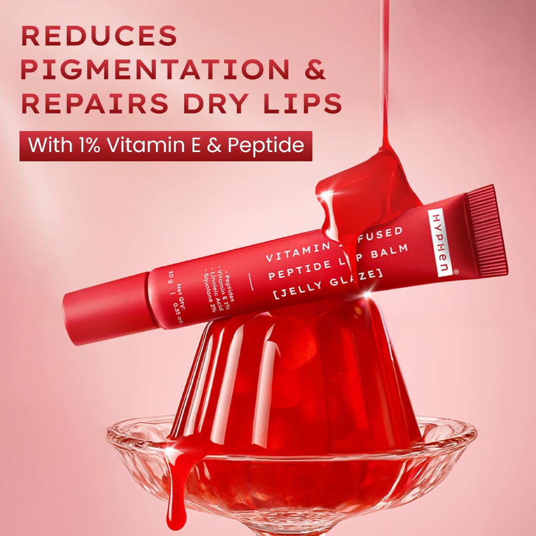 Red lip balm with jelly glaze on a pink background