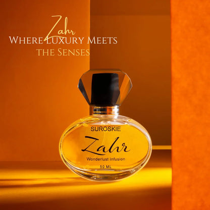 Perfume bottle with 'Zahr' branding on an orange background