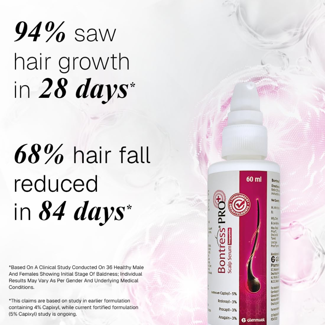 Hair serum bottle with text on hair growth and fall reduction on a white background
