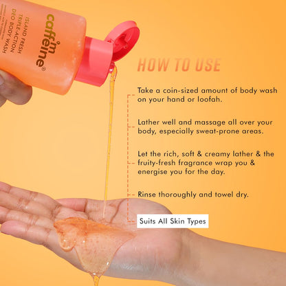 Caffeine Island Fresh body wash being poured onto a hand with usage instructions on an orange background.