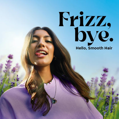 Woman with smooth hair in a field of lavender with 'Frizz, bye. Hello, Smooth Hair' text.