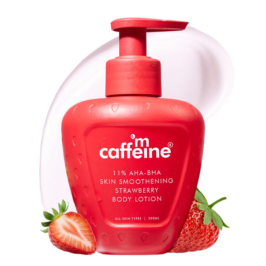 Red bottle of caffeine strawberry body lotion with strawberries on a white background