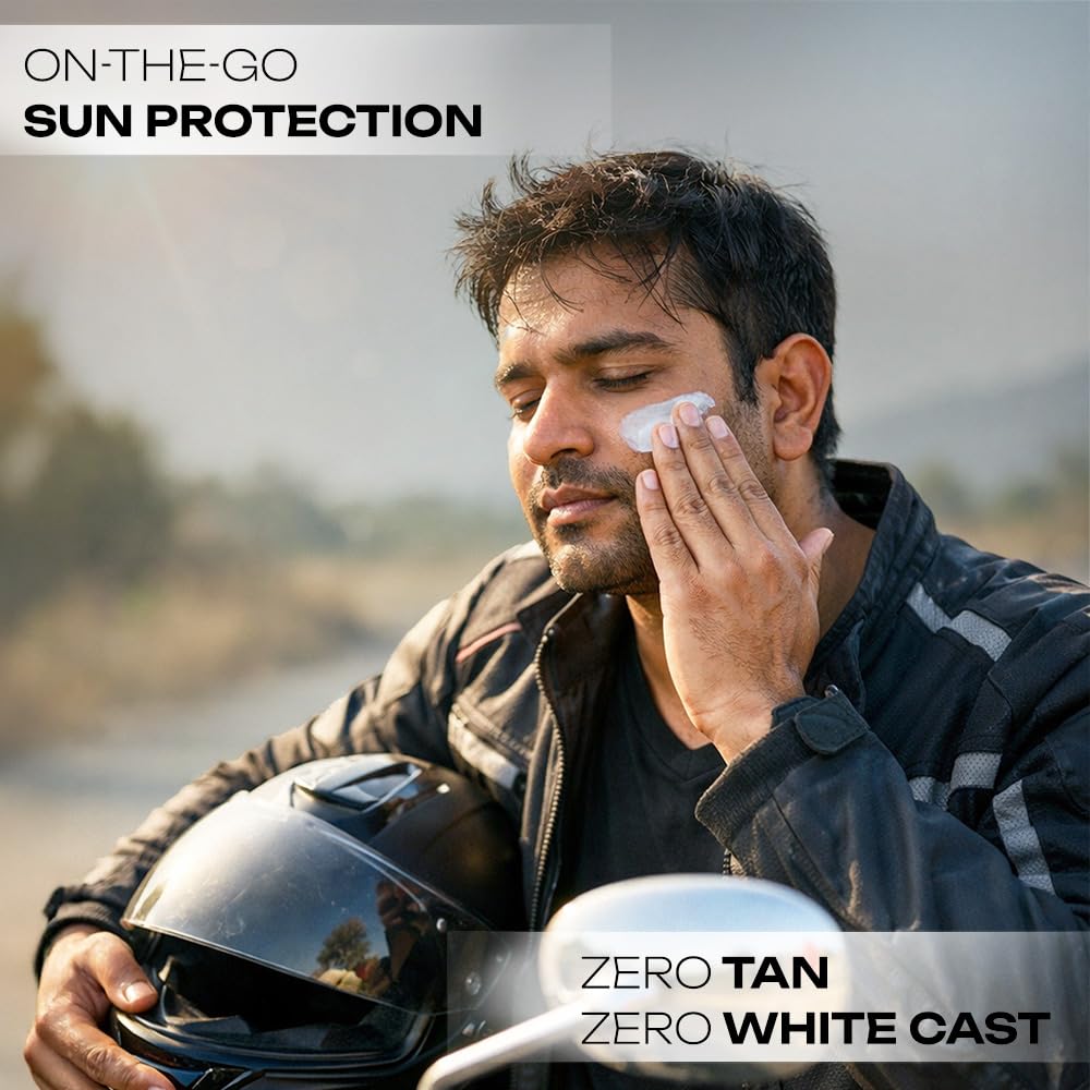 Man applying sun protection cream outdoors with text 'On-the-Go Sun Protection' and 'Zero Tan Zero White Cast'.