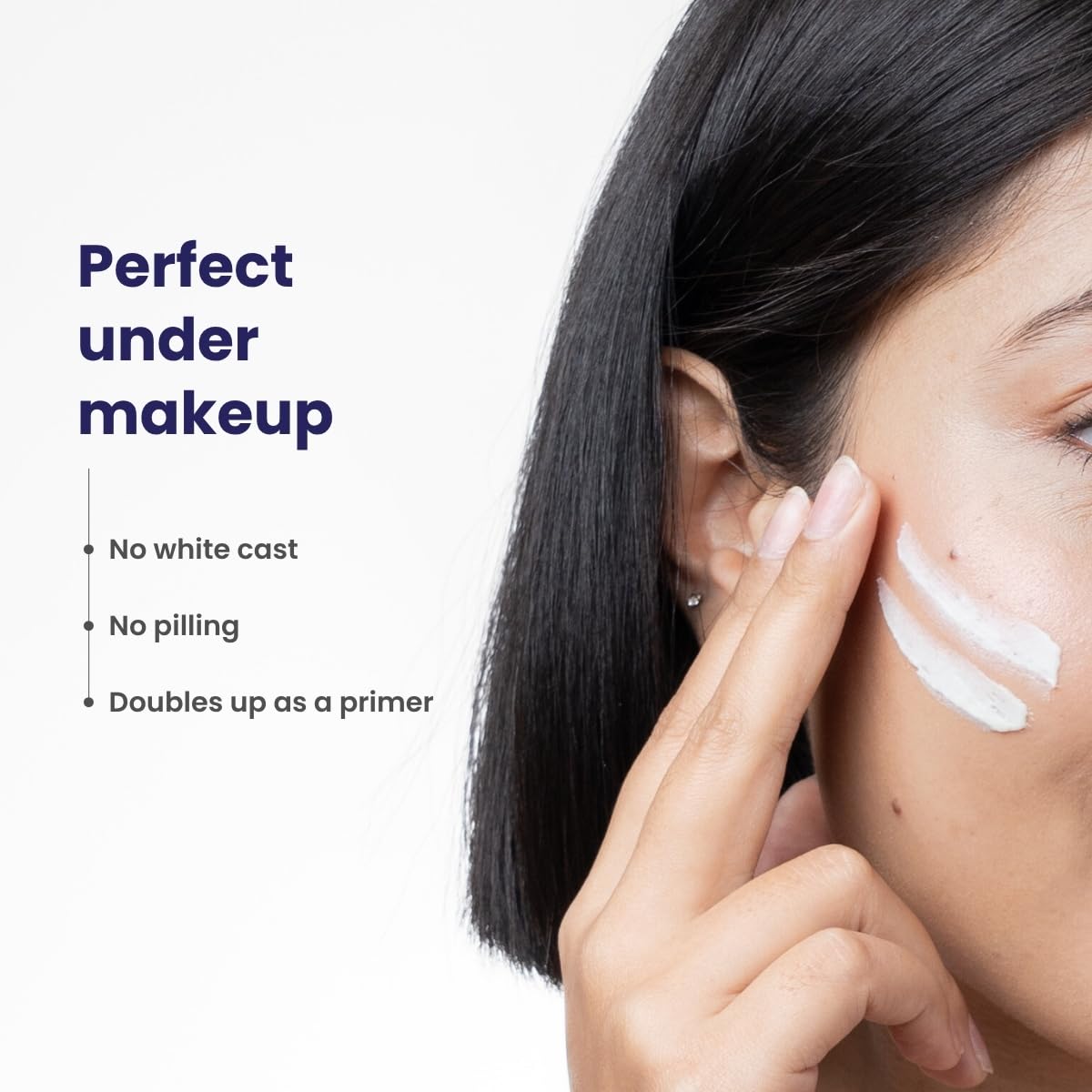 Woman applying a white cream to her face with text highlighting its benefits.