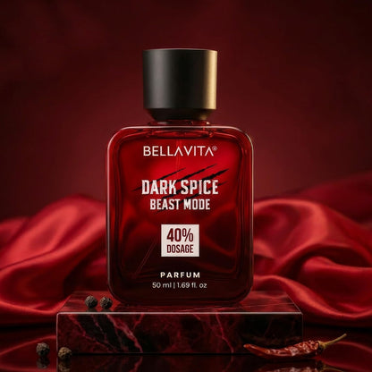 Bottle of Bellavita Dark Spice Beast Mode parfum on a red fabric background