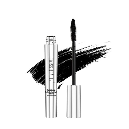 Mascara with silver tube and black wand on a white background