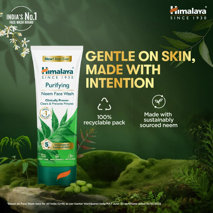 Himalaya Neem Face Wash tube with greenery on a dark green background