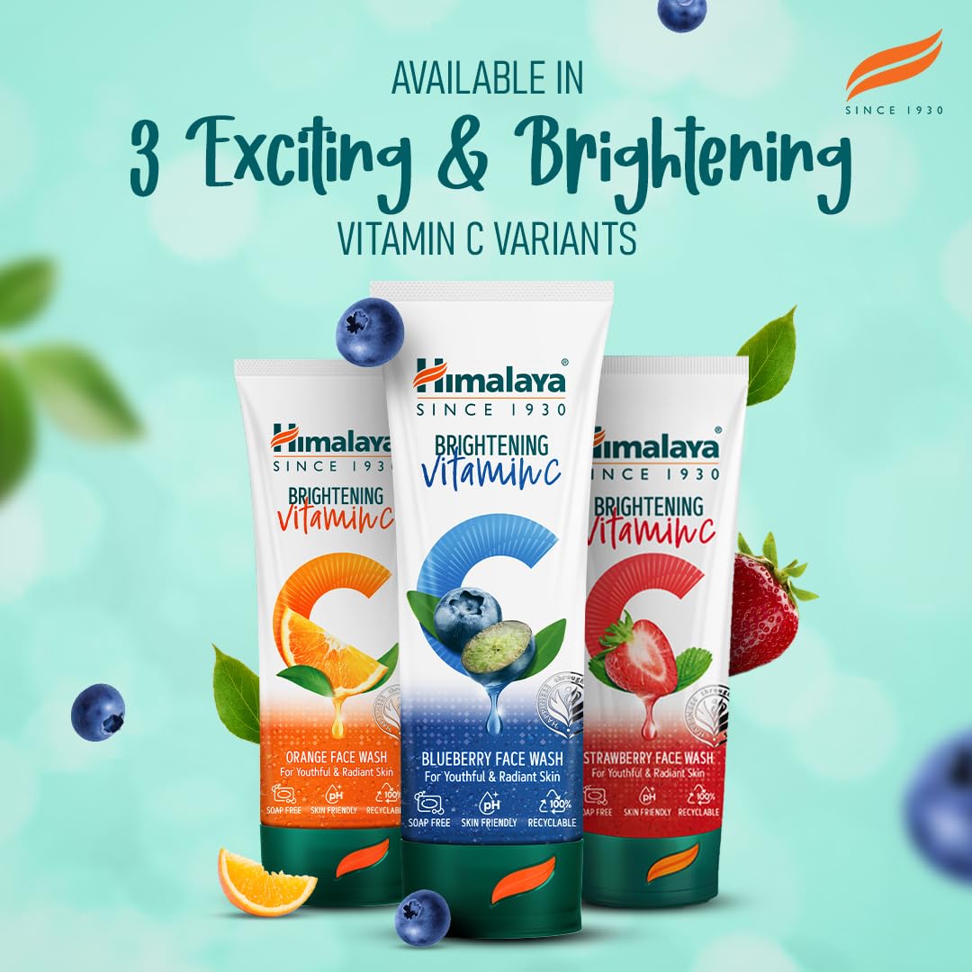 Three tubes of Himalaya Brightening Vitamin C face wash with fruit illustrations on a light blue background.